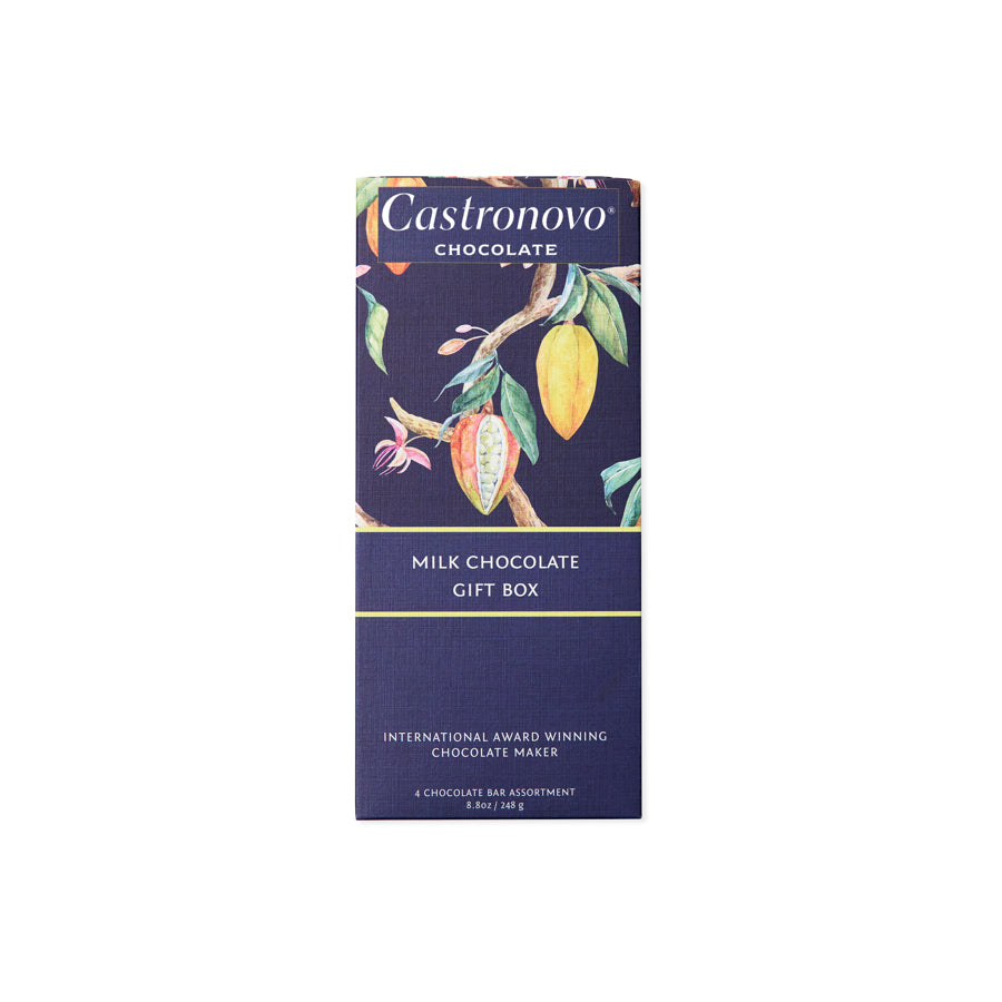 Front view of Castronovo brand milk chocolate gift box outer packaging; contains illustration of cacao pods on tree against navy blue packaging; set against white background 