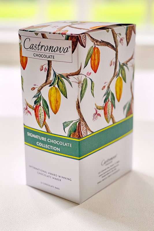 A box of Castronovo Chocolate Signature Collection Gift Set featuring an assortment of dark and milk chocolate bars with different percentages of cocoa.